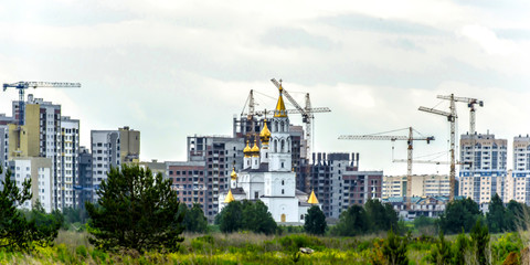 Panorama of construction at the background of the Church .