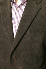 close up of man in a suit with tie and handkerchief