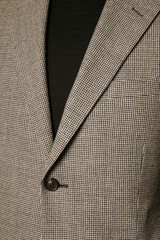 close up of man in a suit with tie and handkerchief