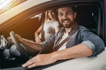 Couple at car dealership