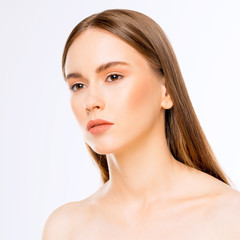 Portrait of Beautiful Woman with Clean Skin, Natural Make Up and Long Shiny Hair. Cosmetology, Beauty and Spa. Close Up