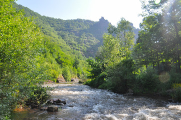 Beautiful view on mountain river under a Old Mountain, Serbia. Wild river with a lot of cascade. Mountain river with a fresh and clean water.