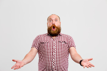 Man with beard waving hands