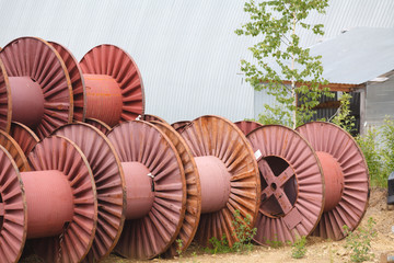 Blank big cable reels of metal for storing data cable.