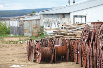 Blank big cable reels of metal for storing data cable.