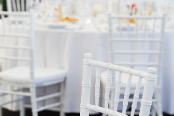 detail of white chair, fancy wedding decoration