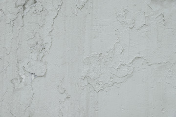 Old white cracked painted wall background texture