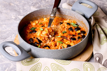 Traditional seafood paella in the fry pan