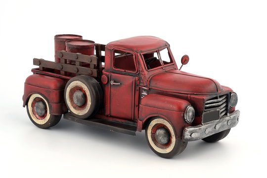 Metal model of an old truck with barrels for fuel (manufactured in 1934)
