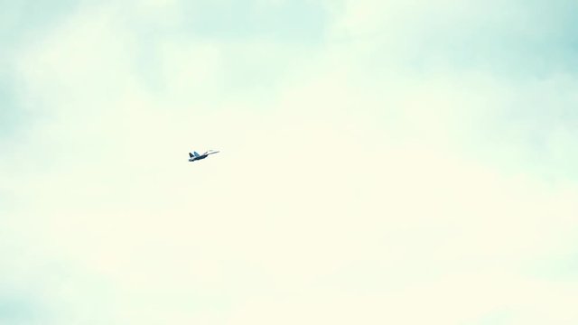 Modern Russian fighter flying in the sky, slow motion