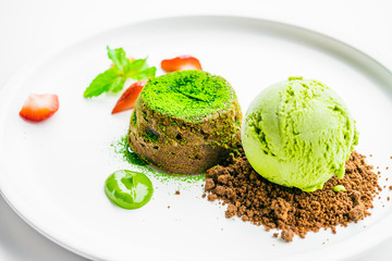 Green tea chocolate lava with ice cream and strawberry