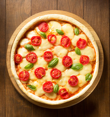 pizza at wooden table