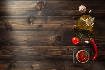 tomato sauce in bowl on wood
