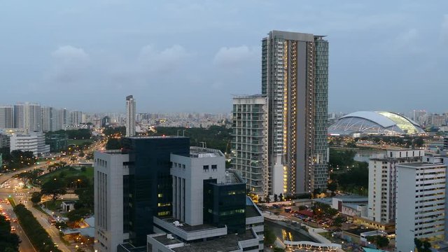 Cityscape In The Evening From Singapore With The National Stadium Seen From A Skyscraper