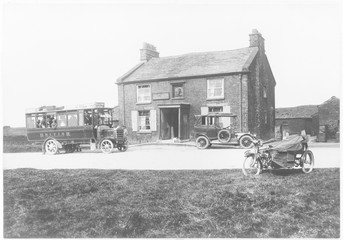 The Buxton Bus arriving at the Cat and Fiddle Pub. Date: 1915