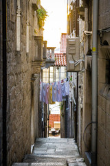Croatian old town narrow street at susnet - 162249836