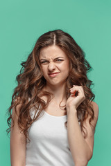 The portrait of disgusted woman