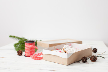 Packaging of Christmas gift ribbon on a white