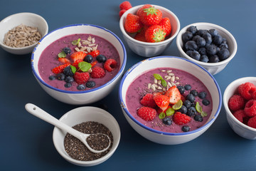 healthy berry smoothie bowl with strawberry blueberry raspberry and chia seed