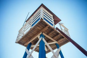 guard tower at the ocean from below