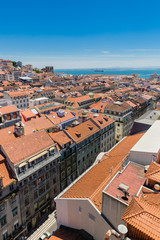 Fototapeta na wymiar Aerial view of the red roofs of Alfama, the historic area of Lisbon