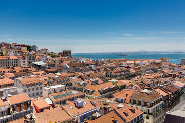 Fototapeta na wymiar Aerial view of the red roofs of Alfama, the historic area of Lisbon