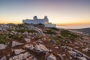Church of Agios Symeon above Kamares village at sunset.
 - obrazy, fototapety, plakaty