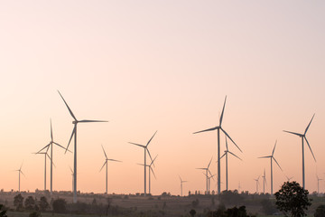 Wind turbine renewable energy at sunset