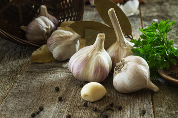 Garlic with bay leaves, parsley and paprika peas closeu