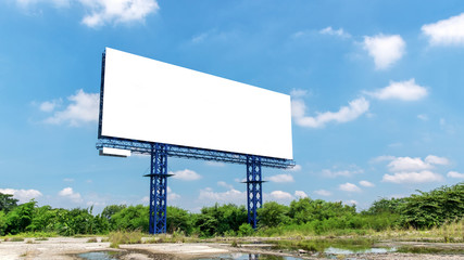 Blank billboard on a bright blue day  ready for new advertisement.