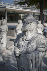 Fototapeta na wymiar Chinese Zodiac, stone Rooster statue at Seoul