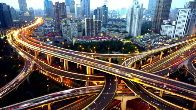 4k,Aerial View of freeway busy city rush hour heavy traffic jam highway,shanghai Yan'an East Road Overpass interchange,driving & cars racing by with streaking lights trail from day to night.