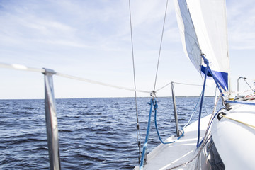 Sailboat sails on the sea