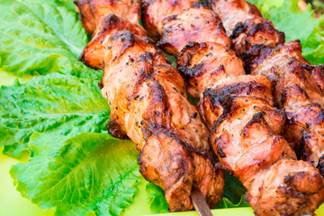 Cooking meat outdoors. Fried meat old recipe.