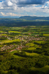 Fototapeta na wymiar Landscape mountains, village houses. A view of the earth from the sky. Shooting with copter. France. Nature in summer