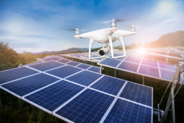 Drone with camera fly over Solar panels ; Photovoltaic systems .