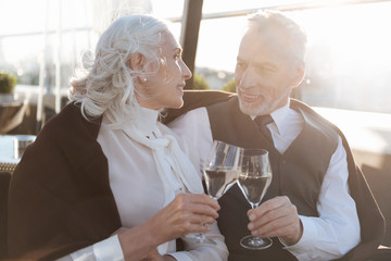 Mature female turning her head to partner