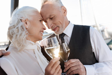 Tender man feeling happiness with this woman