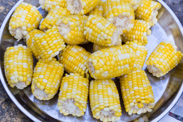 Plateful of fresh sweet organic corn steamed ready to eat