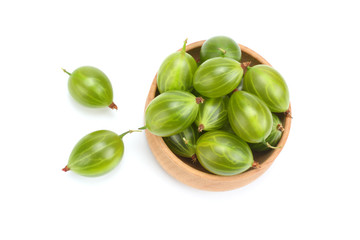 Gooseberry in wooden bowl isolated on white background.
