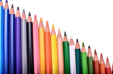 Many colored pencils isolated on white background, place for text