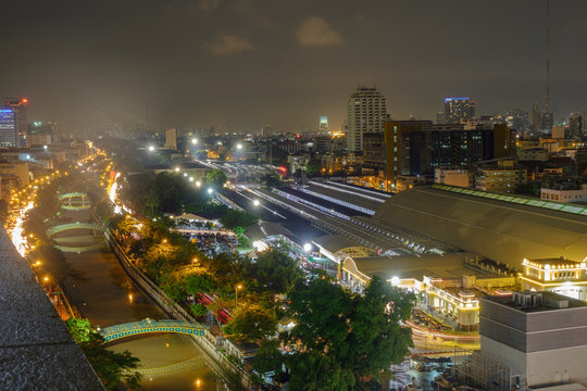 Transportation system / View of transportation system and city at night. Bangkok train station (HUA LUMPONG).