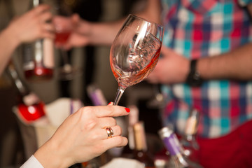 people with alcohol drinks in glasses