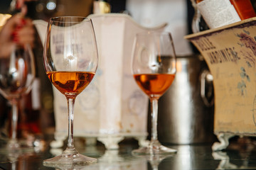 alcohol drinks in glasses on the table