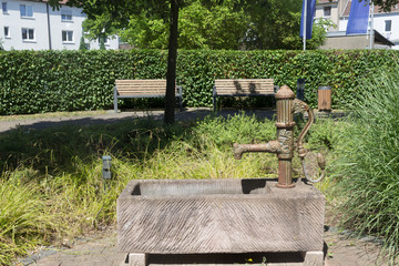 Park bench and fountain