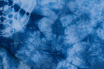 Dyed indigo fabric background and textured, Painted blue watercolor on white cotton cloth