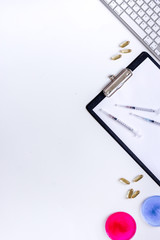 Heathcare concept. Medical tests. Syringe, pills, Petri dish on white background top view copyspace
