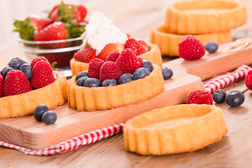 Tartlets with forest fruits. 