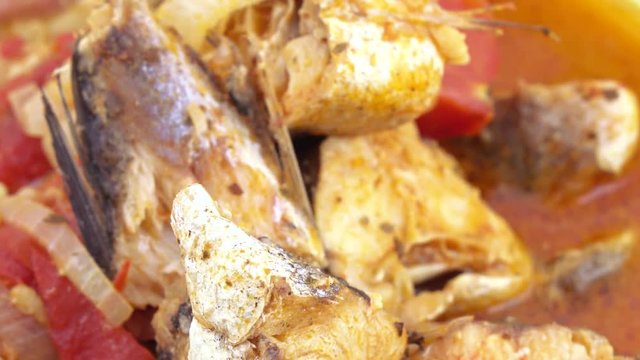 Fried pollock with onions