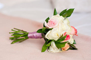 Fototapeta na wymiar Stylish beautiful bouquet for a bride from live roses